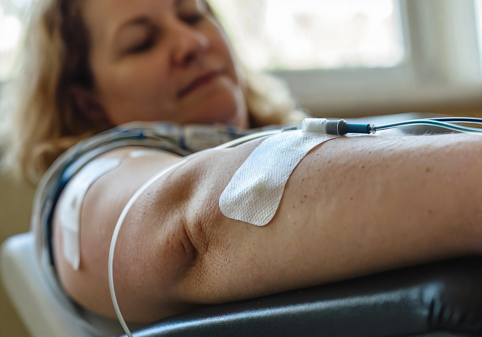 A patient receiving IV hydration therapy at the TOTAL DRIP infusion clinic in Covington, Louisiana