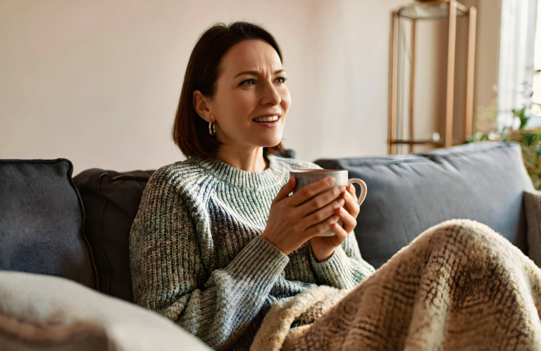 Covington woman resting at home with tea while recovering from bronchitis and a lingering cough